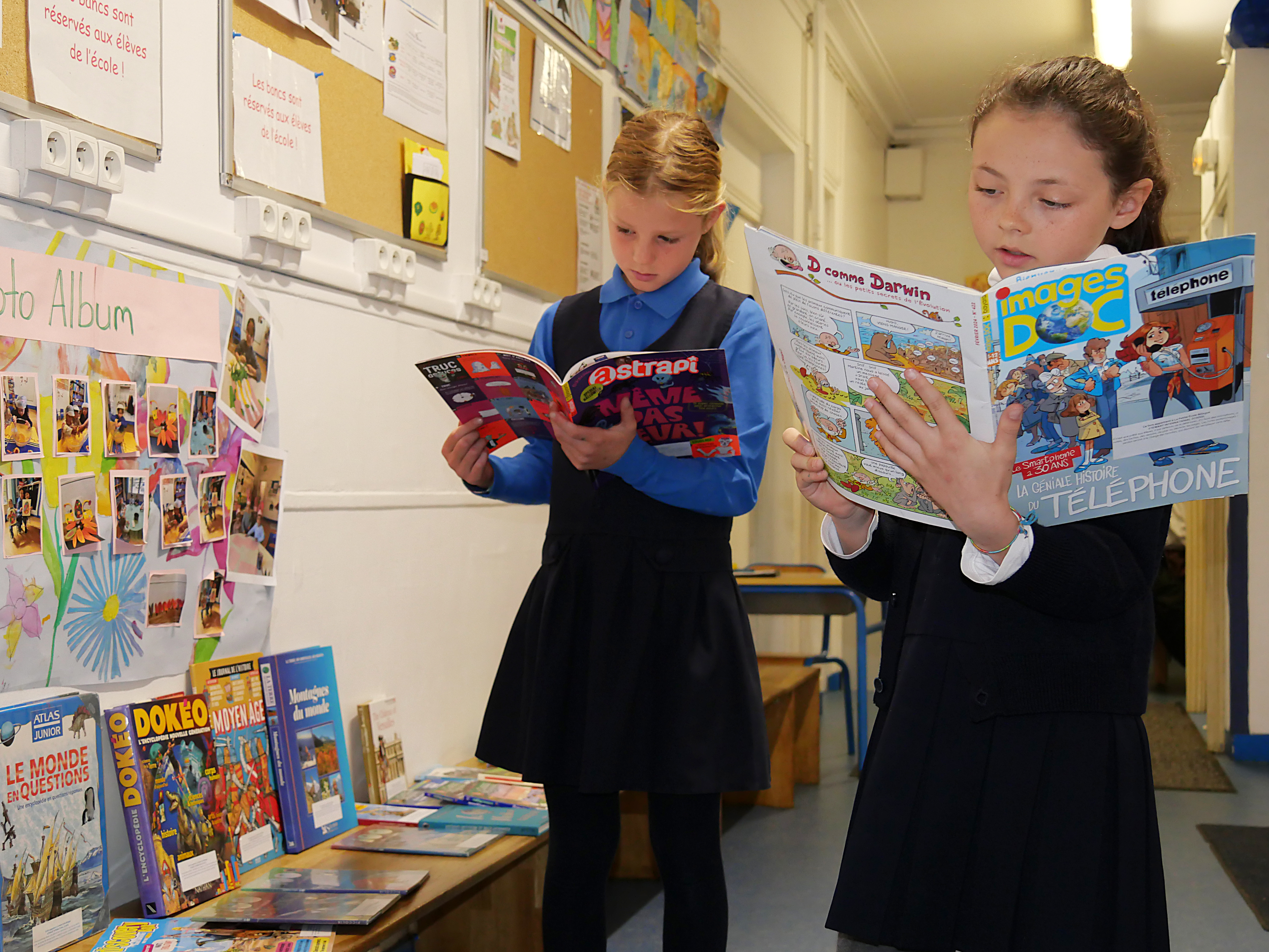 Children reading in library